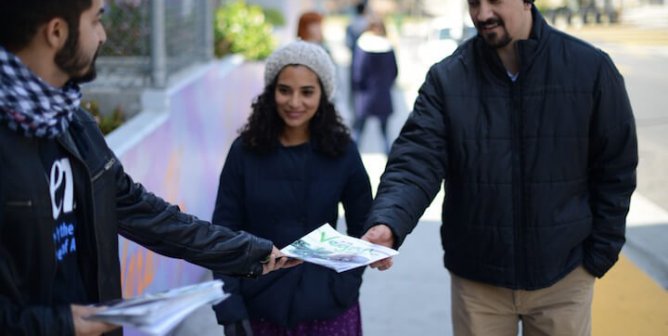 Activists Handing Out Leaflets