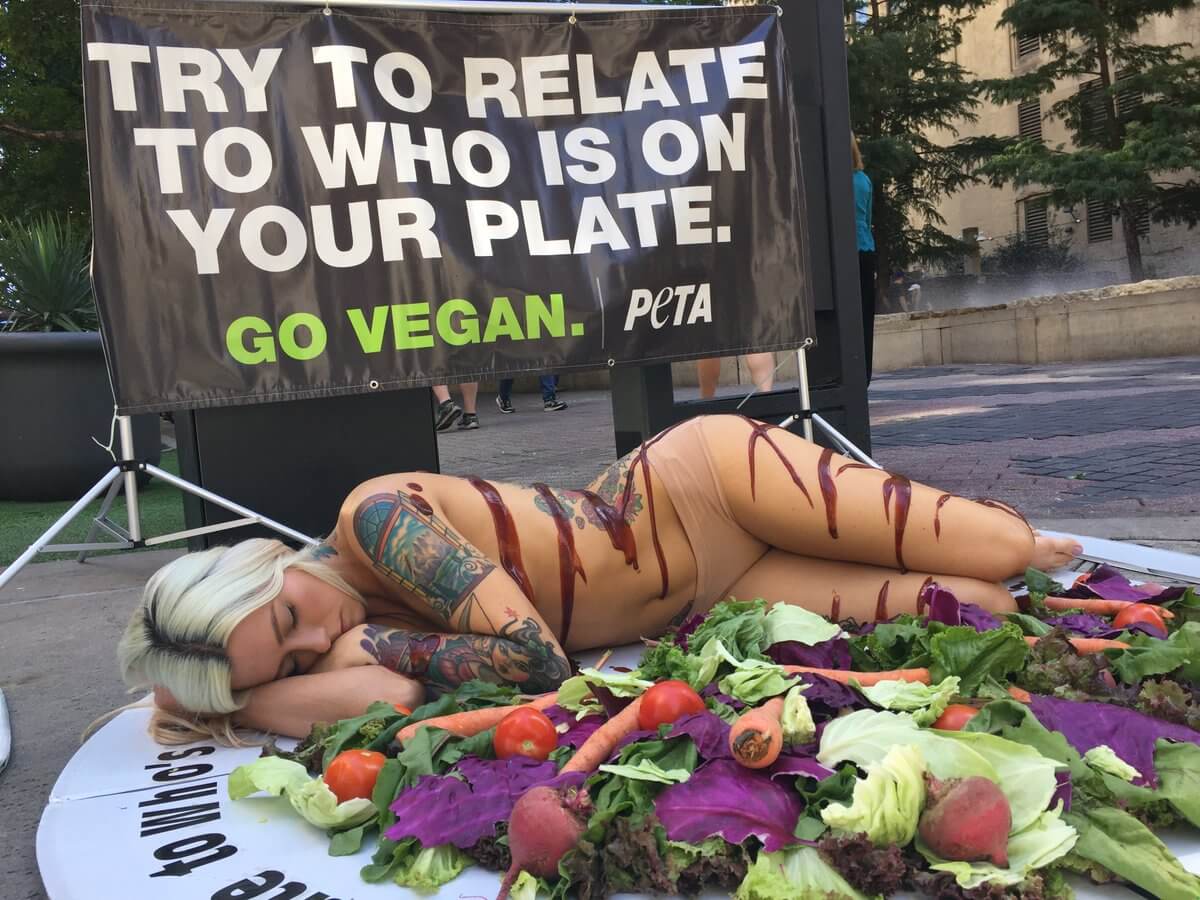 Nearly Naked Woman on a Giant Plate Stops Traffic in Dallas and Shreveport  (Photos) | PETA