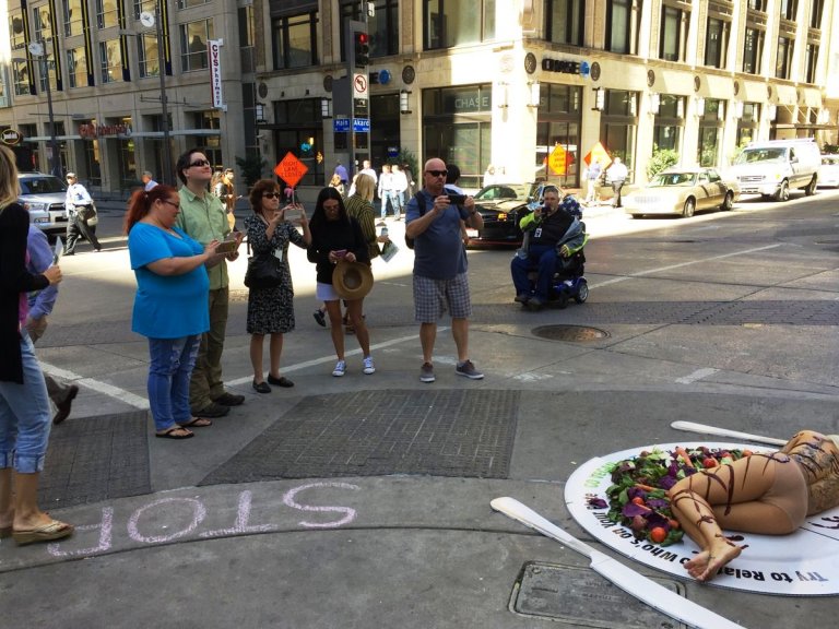 Nearly Naked Woman On A Giant Plate Stops Traffic In Dallas And