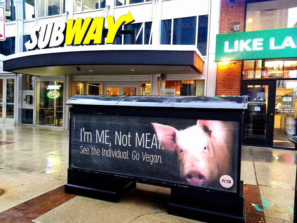 A New PETA Holiday Ad Blitz Is Making Fast-Food Diners Think Twice | PETA