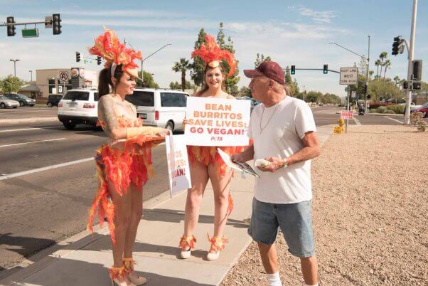 PETA activists meet with locals and hand out vegan burritos near a Taco Bell in Phoenix
