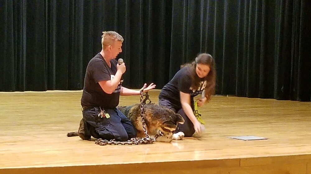 During an animal-care presentation, two PETA fieldworkers inform students about the detrimental effects of neglecting and chaining dogs.