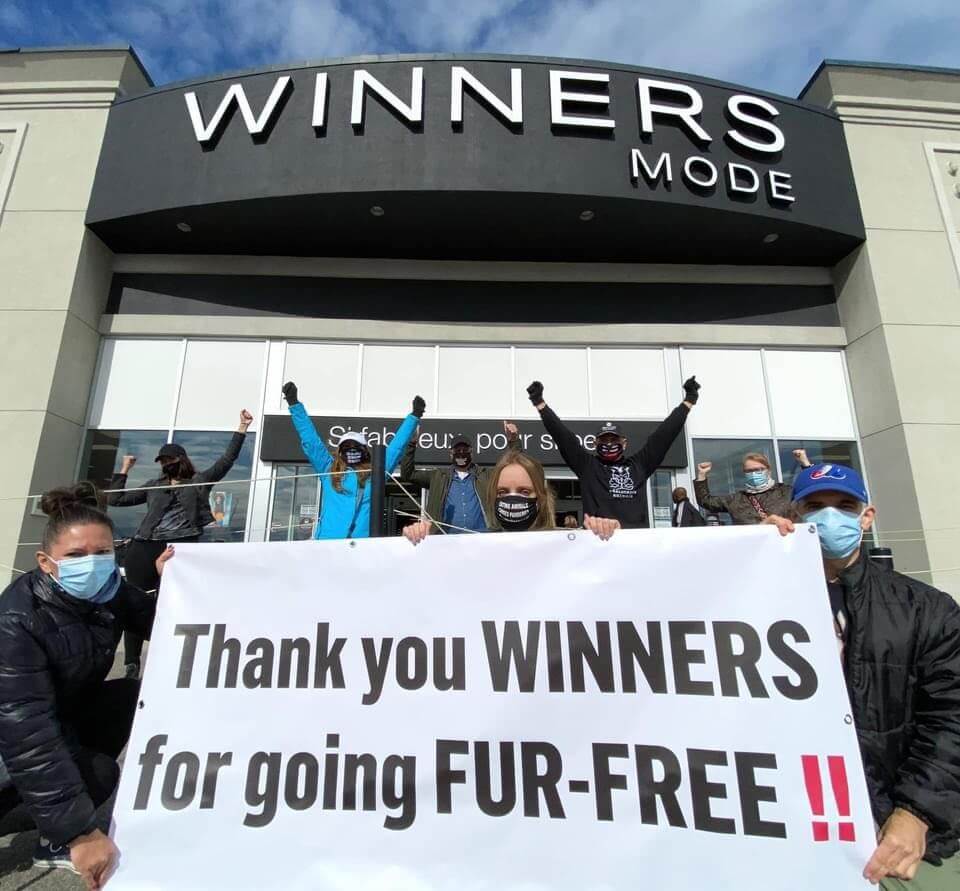 local activists hold demo with sign thanking Winners for going fur free