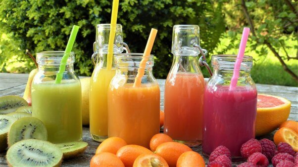 Assortment of different colored and types of fruit juices