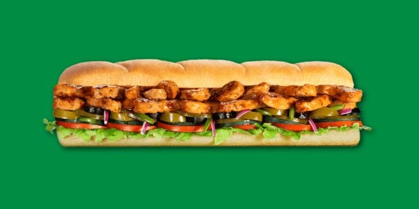 Subway México's vegan Teriyaki Veg sandwich prmotional image on a green background