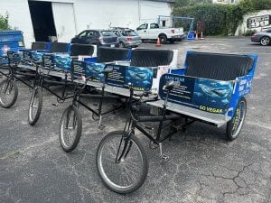 Bycatch ads printed on a row of pedicabs