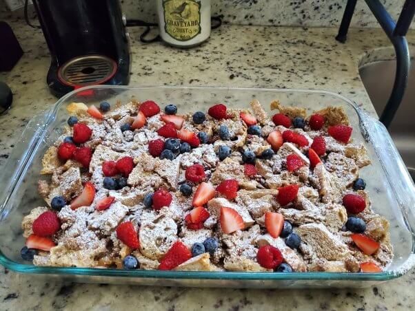 vegan french toast casserole with berries on top