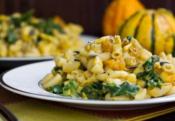 a plate piled high with vegan pumpkin mac and cheese