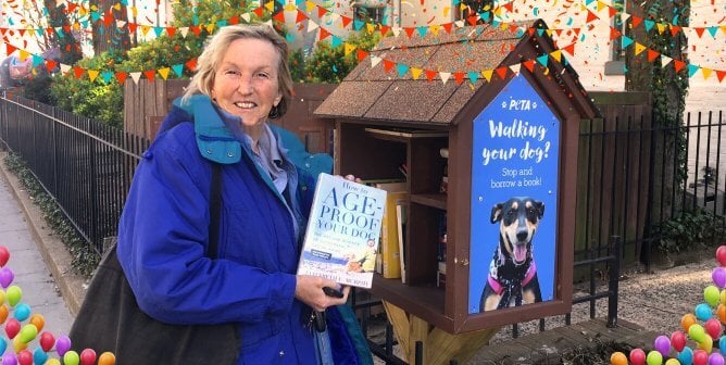 Ingrid Newkirk with little free library