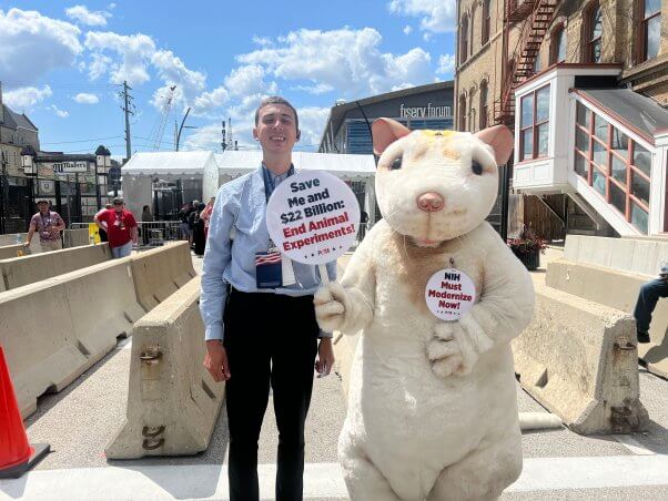 PETA Mouse with tall young man at 2024 RNC