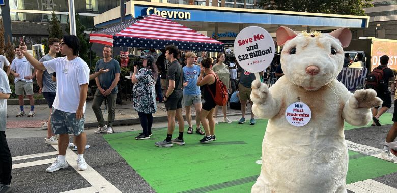 ‘Mouse’ Calls Out Cruel Tests on Animals Outside Presidential Debate in Georgia
