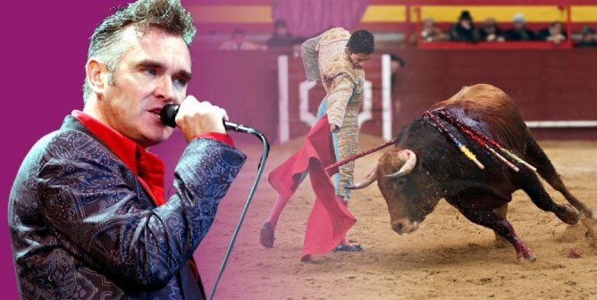 Morrissey with mic on purple background next to bullfighting event