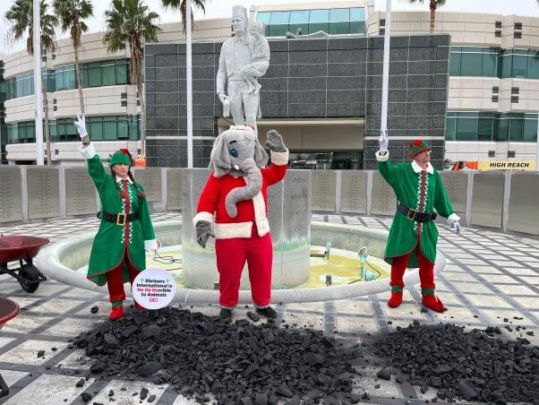 PETA protesters in holiday outfits confront the Shriners over animal abuse in shrine circuses