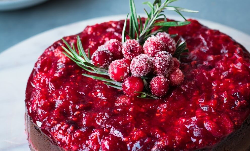 Chocolate cheesecake with cranberry-raspberry compote