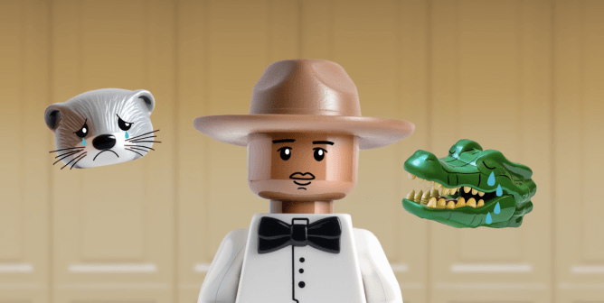 lego animated pharrell next to crying mink and crocodile in "It's Not Classy" video calling out Louis Vuitton