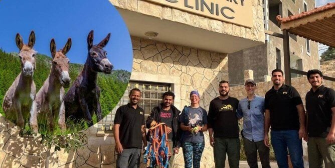 Group photo in front of Petra Veterinary Clinic