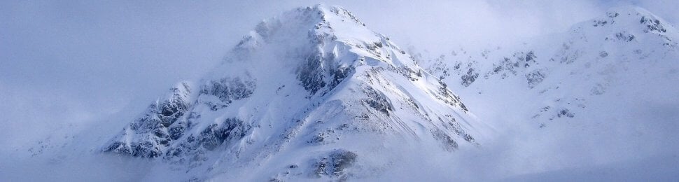 Photo of a snowy mountain