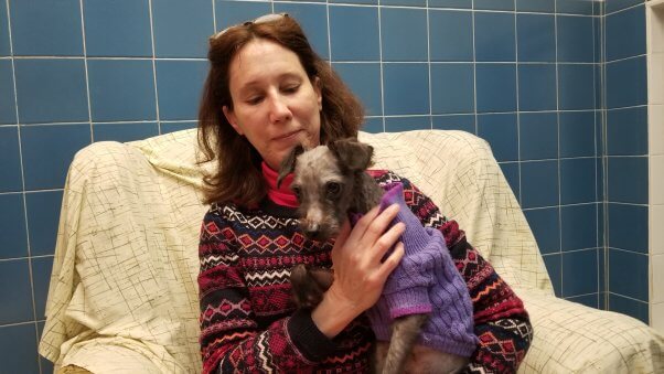 Alisa with rescued dog Fritz after grooming